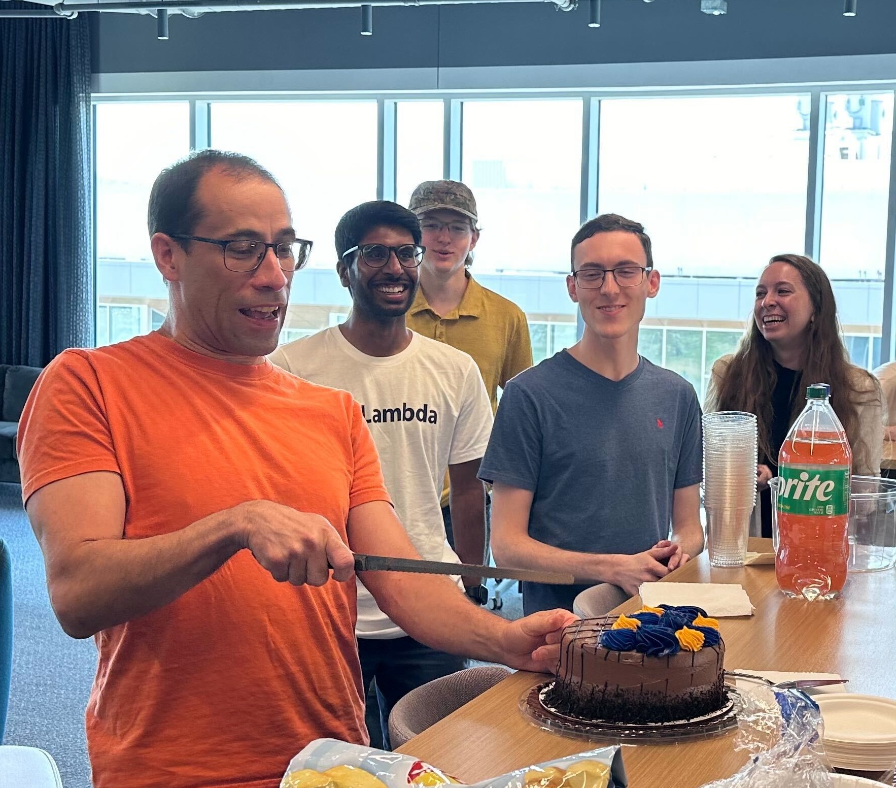 Felipe cutting cake